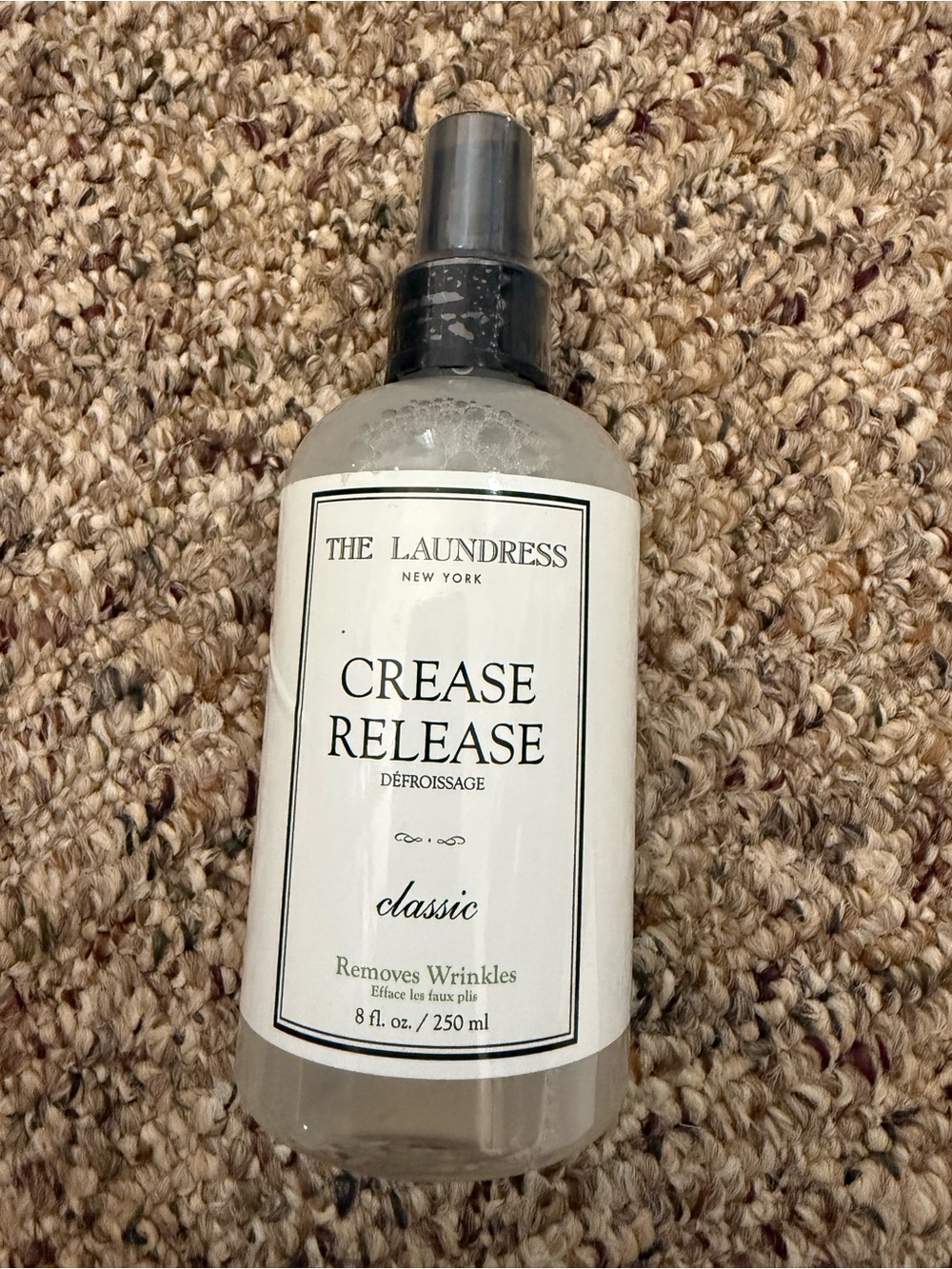 The Laundress Crease Release Spray - Clear Bottle with Black Cap